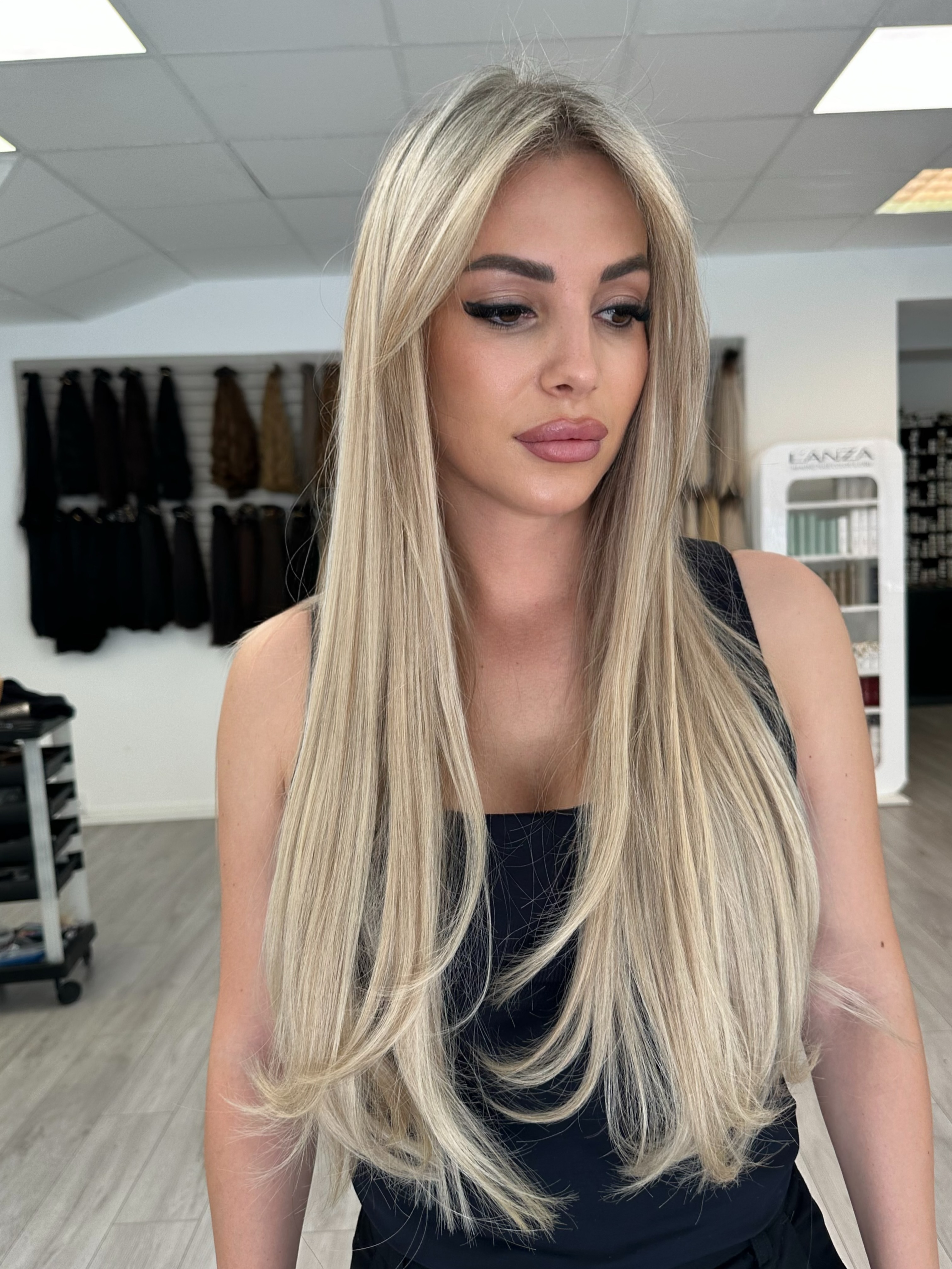 Blonde Haarverlängerung, glatt und voluminös